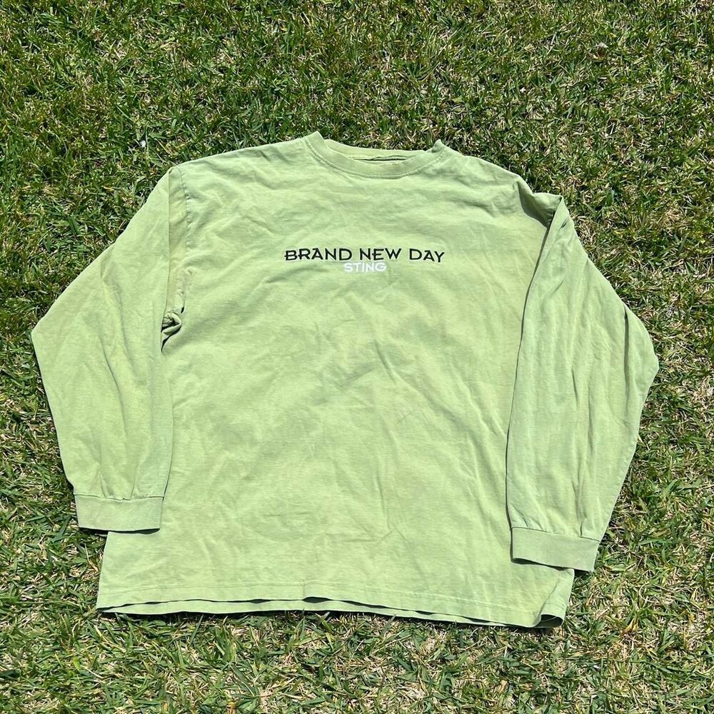 90s Green Sting New Day long sleeve shirt with black text reading 'BRAND NEW DAY